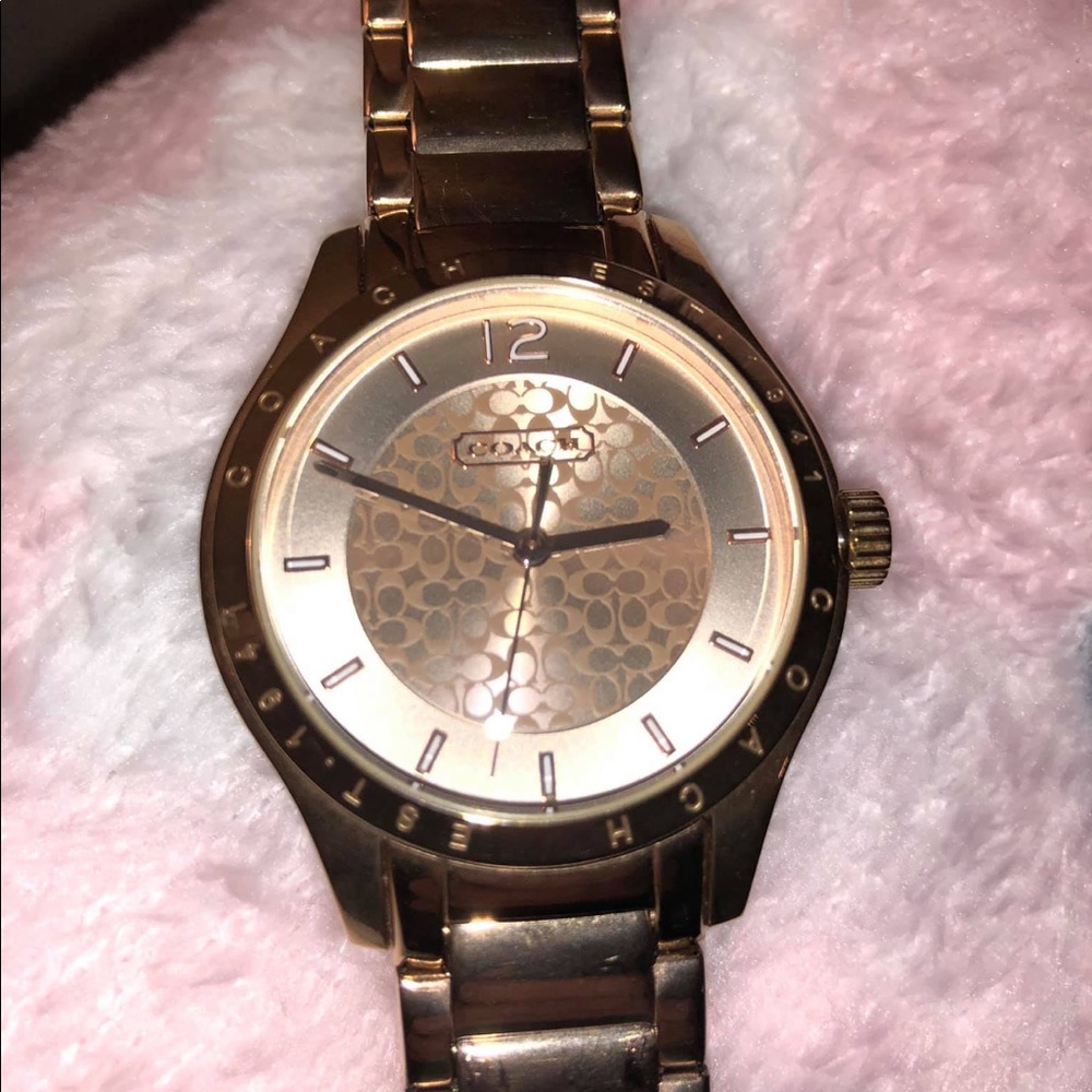 Authentic Coach watch rose gold in color